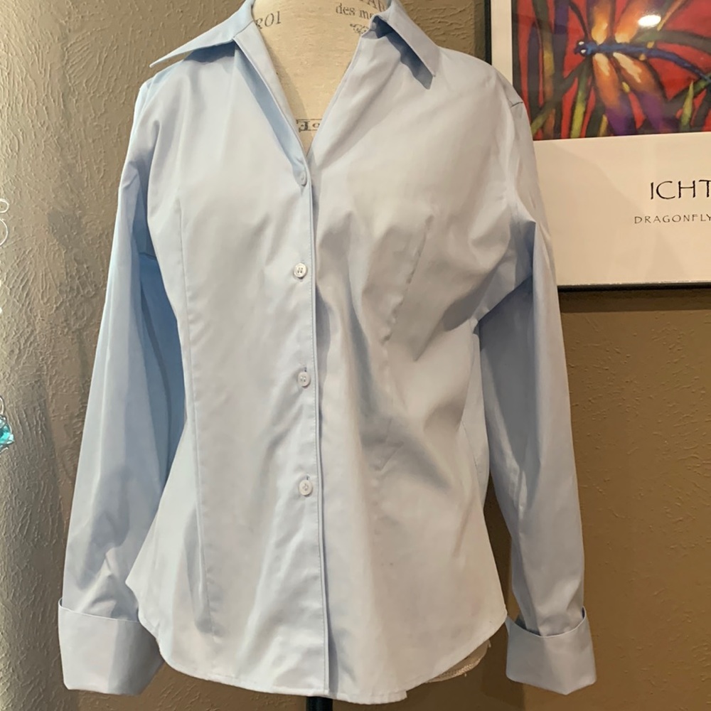 Calvin Klein light blue shirt.  No-iron, 100% cotton, French cuffs.